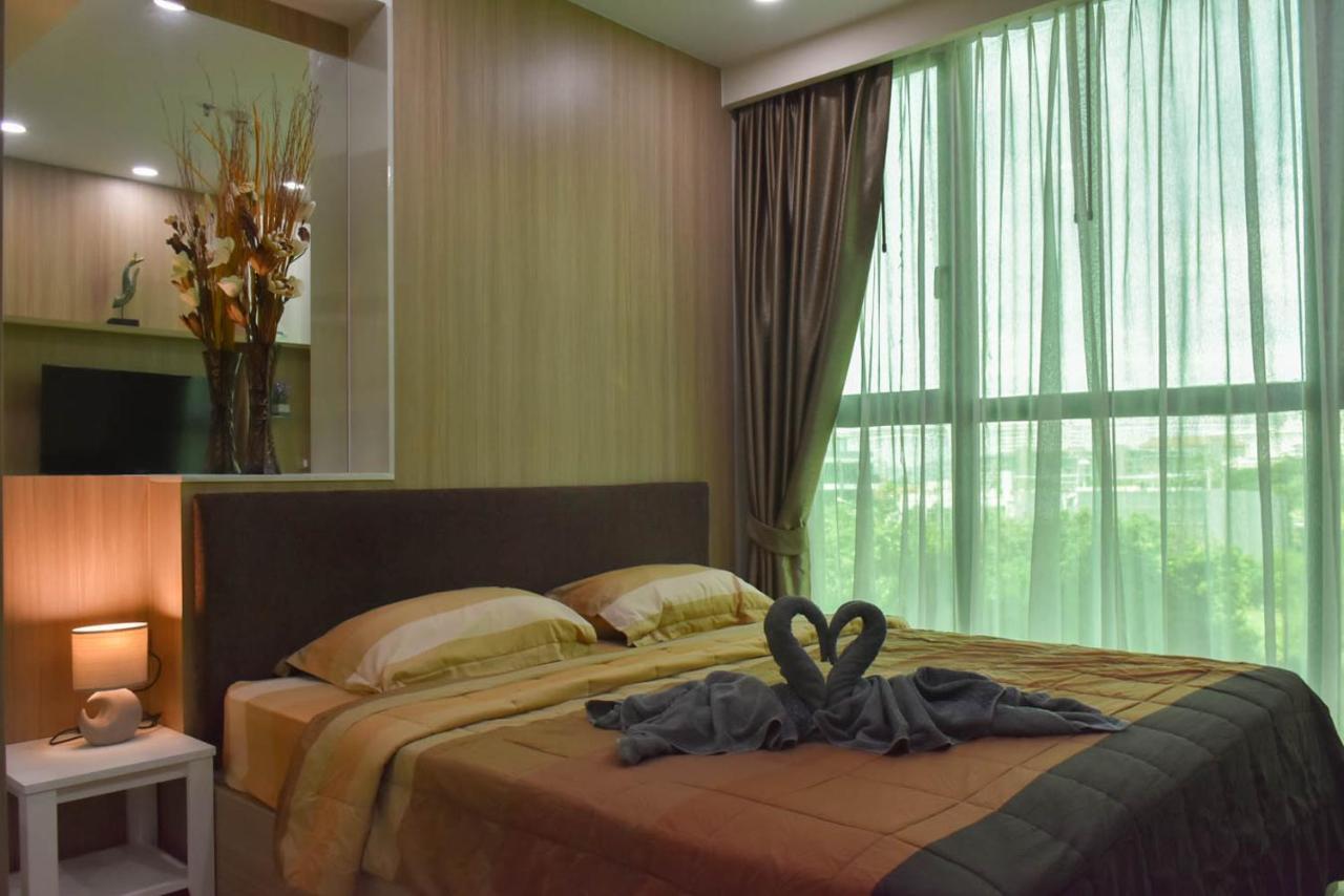 Dusit Grand Condo View Jomtien Habitación foto
